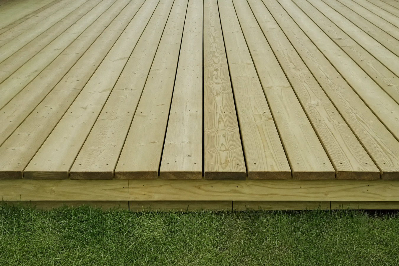 Pressure-treated wood deck construction